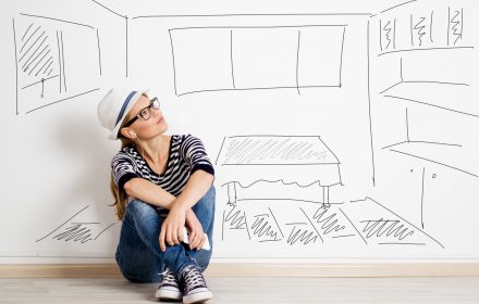 Dreaming woman in headset over drawn living room background